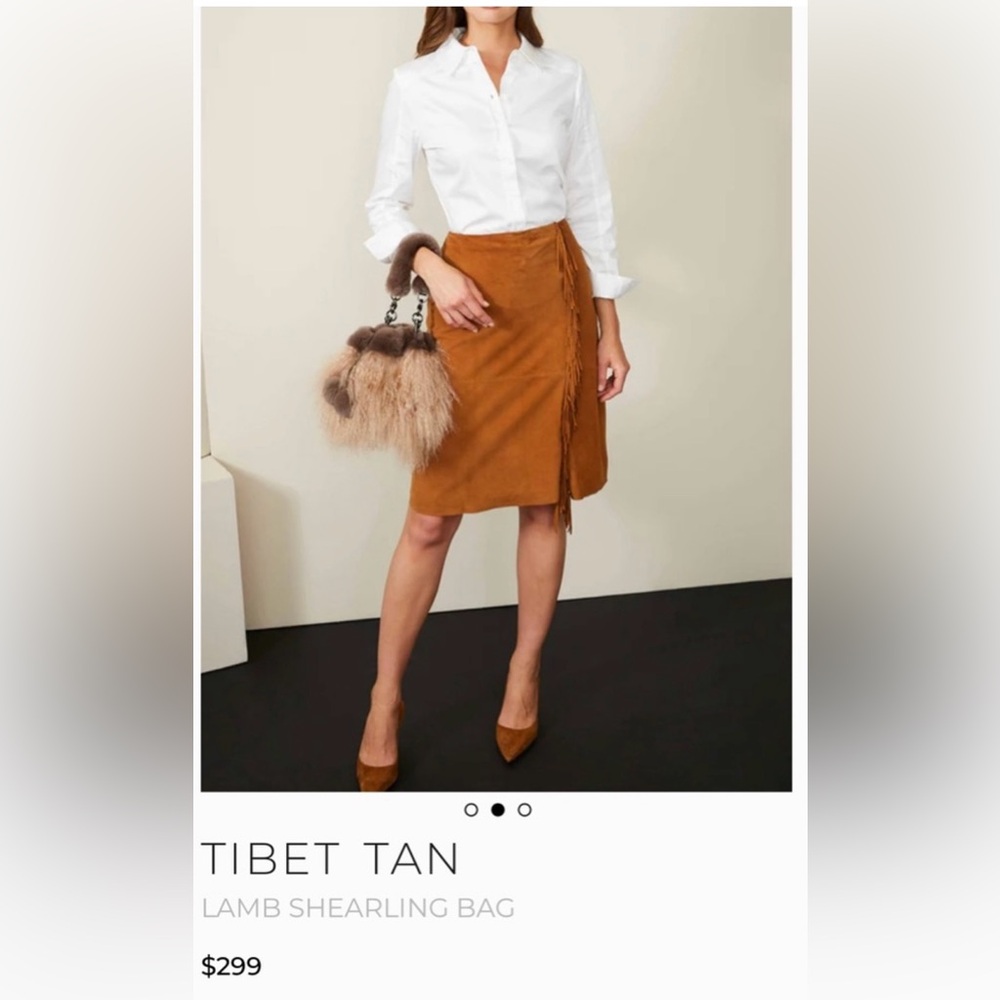 Etcetera Tibetan tan lamb shearling bag.